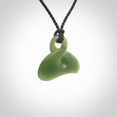 Hand carved smaller sized, New Zealand jade twist pendant. Carved in New Zealand by NZ Pacific.